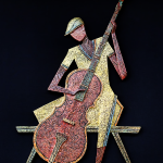 RHYTHM & HUE: BASS PLAYER WALL SCULPTURE